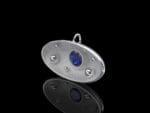 Andromedha galaxy gold pendant in 18k white gold with a sapphire