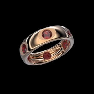 Menrwa Ring in 18k rose gold — sculptural rubies inspired by Menrva, the Etruscan goddess of wisdom and sacred craft.