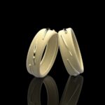 Arhinna ring 18k gold sand-brushed band polished incisions two-tone