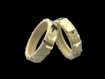 Asteria ring 18k gold wide band polished star forms sand-brushed