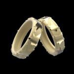 Asteria ring 18k gold wide band polished star forms sand-brushed