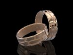 Klastys Ring in 18k rose and rose gold — crackle-patterned band inspired by Ginnungagap, the Norse primordial void where the world was born.