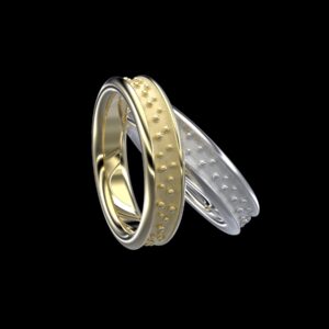 Lakshmi Ring in 18k yellow and white gold — granulation-textured band inspired by Lakshmi, the Hindu goddess of wealth and sacred abundance