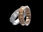 Meryn Ring in 18k rose and white gold — faceted geometric Celtic wedding band with two-tone mixed metal option.