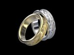 Meryn Ring in 18k yellow and white gold — faceted geometric Celtic wedding band with two-tone mixed metal option.