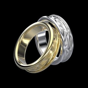 Meryn Ring in 18k yellow and white gold — faceted geometric Celtic wedding band with two-tone mixed metal option.