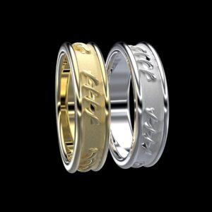 Myrina Ring in 18k white and yellow gold — wide engraved band inspired by Queen Myrina, the Amazon warrior who conquered north of Africa and named a city.